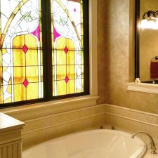 Master Bath Shimmering Lusterstone walls with custom faux designed mirror frames 1
